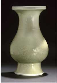 Kangxi A carved celadon ground pear-shaped vase
